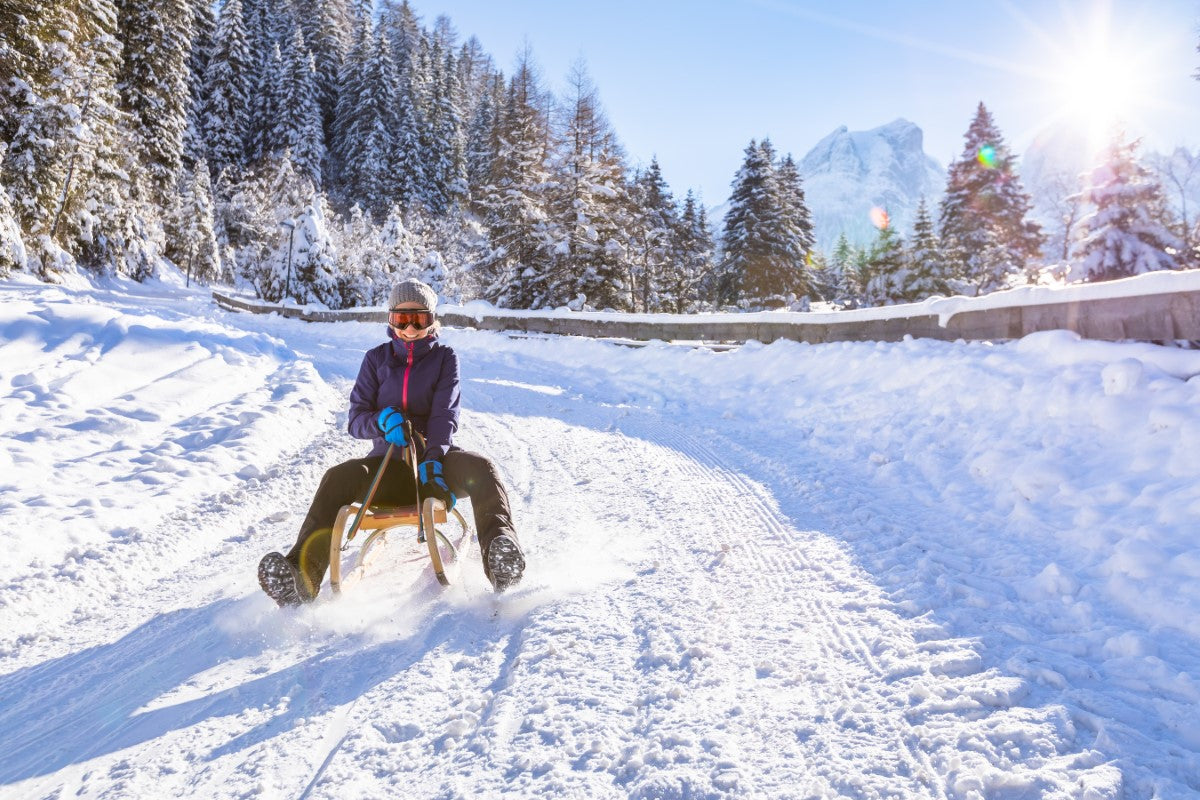 Sledding and Snowboarding: Tips to Keep your Kids Warm